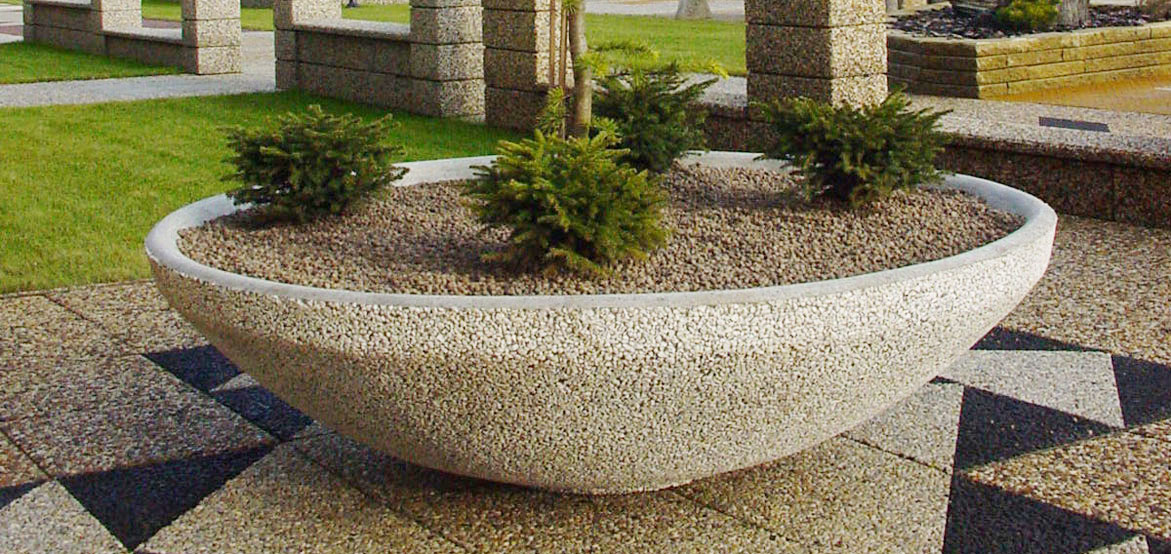 Fossano donica okrągła wykonana w technologii betonu płukanego. Dostępna w ofercie producenta małej architektury betonowej - firmy STYL-BET