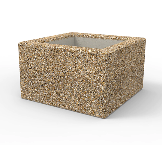 Duża, niewysoka donica z betonu płukanego. Dostępna w bogatej ofercie kolorystycznej kamienia naturalnego.